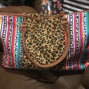 Serpa and cheetah print weekender bag